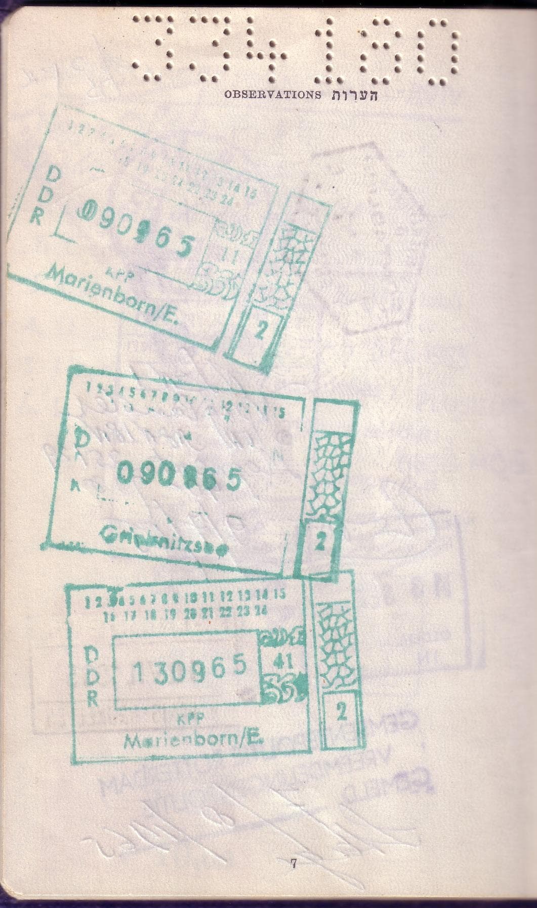 Various stamped visa entries and exit stamps in a passport showing border crossing documentation