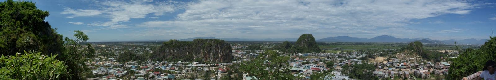 Aerial view of five distinctive limestone and marble mountain peaks rising from the coastal plain near Đà Nẵng